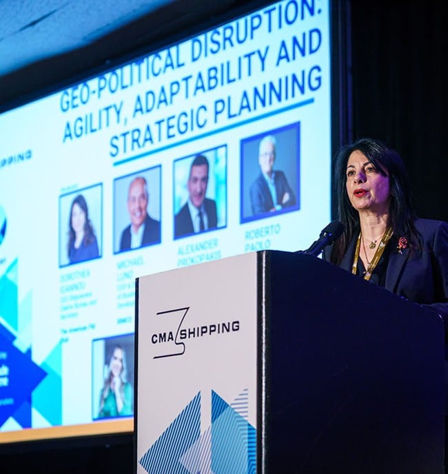 woman speaking at podium